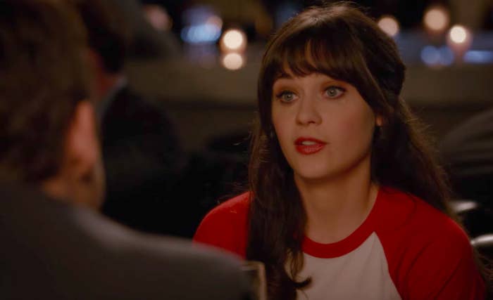 Jess wearing a red and white baseball tee on &quot;New Girl&quot;