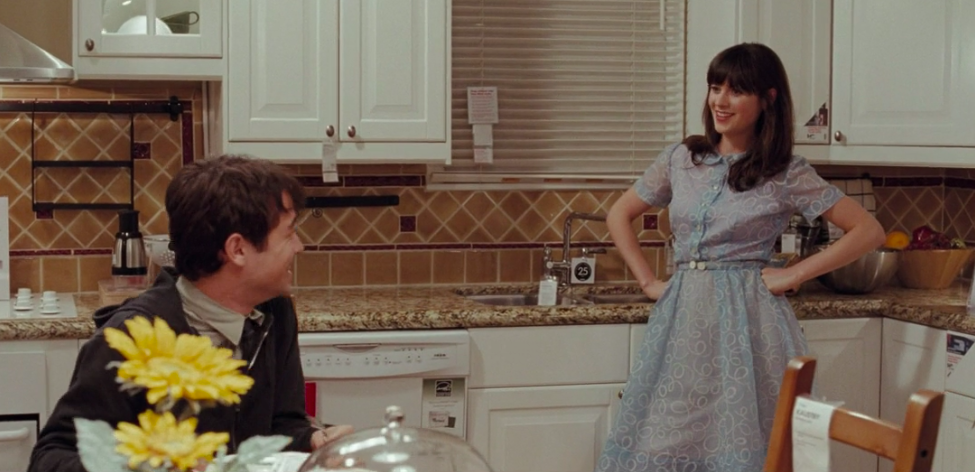 Summer wearing a button-up dress in an IKEA in &quot;500 Days of Summer&quot;
