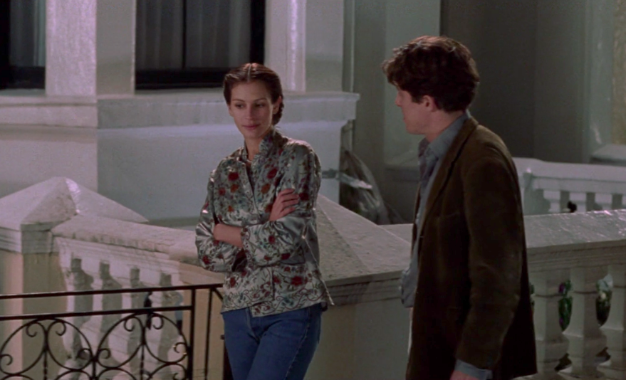 Hugh Grant and Julia Roberts walking outside in &quot;Notting Hill&quot;