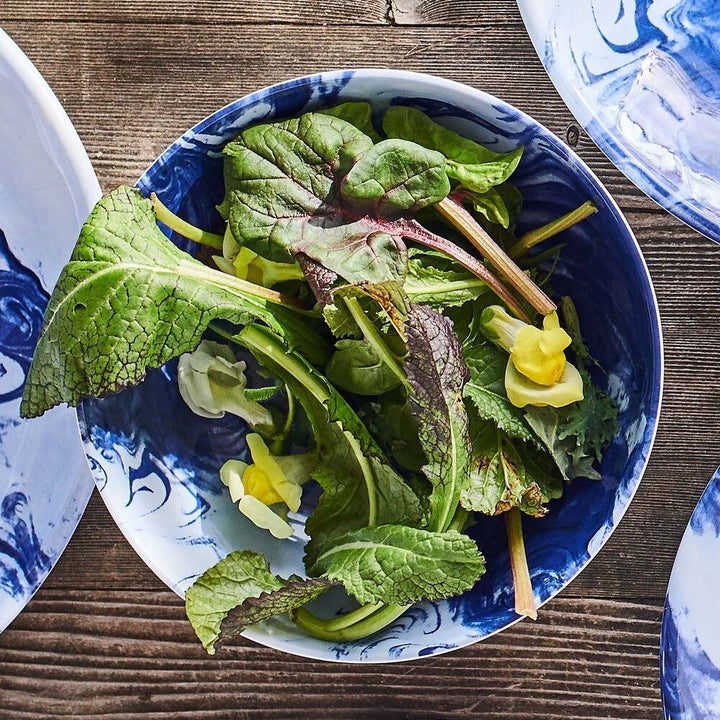 marble blue bowl with salad in it