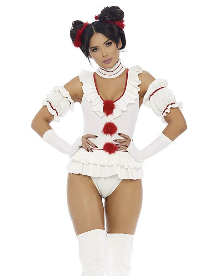 A white leotard with red pom poms down the center