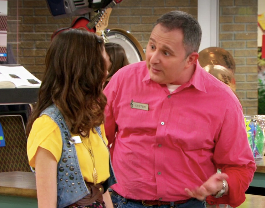 Lester lectures Ally in the middle of the store
