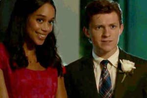 Liz smiles while standing next to Peter Parker before they go to their homecoming dance