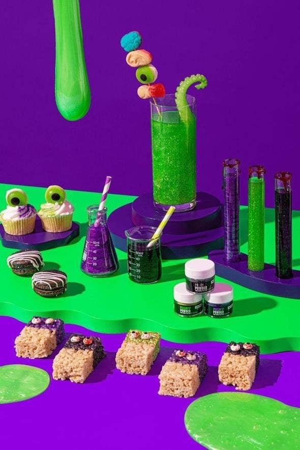 glittery treats and drinks in purple, green, and black glitter