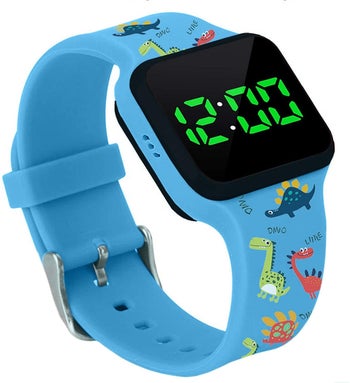 The blue watch with a dinosaur print wrist band and green timer