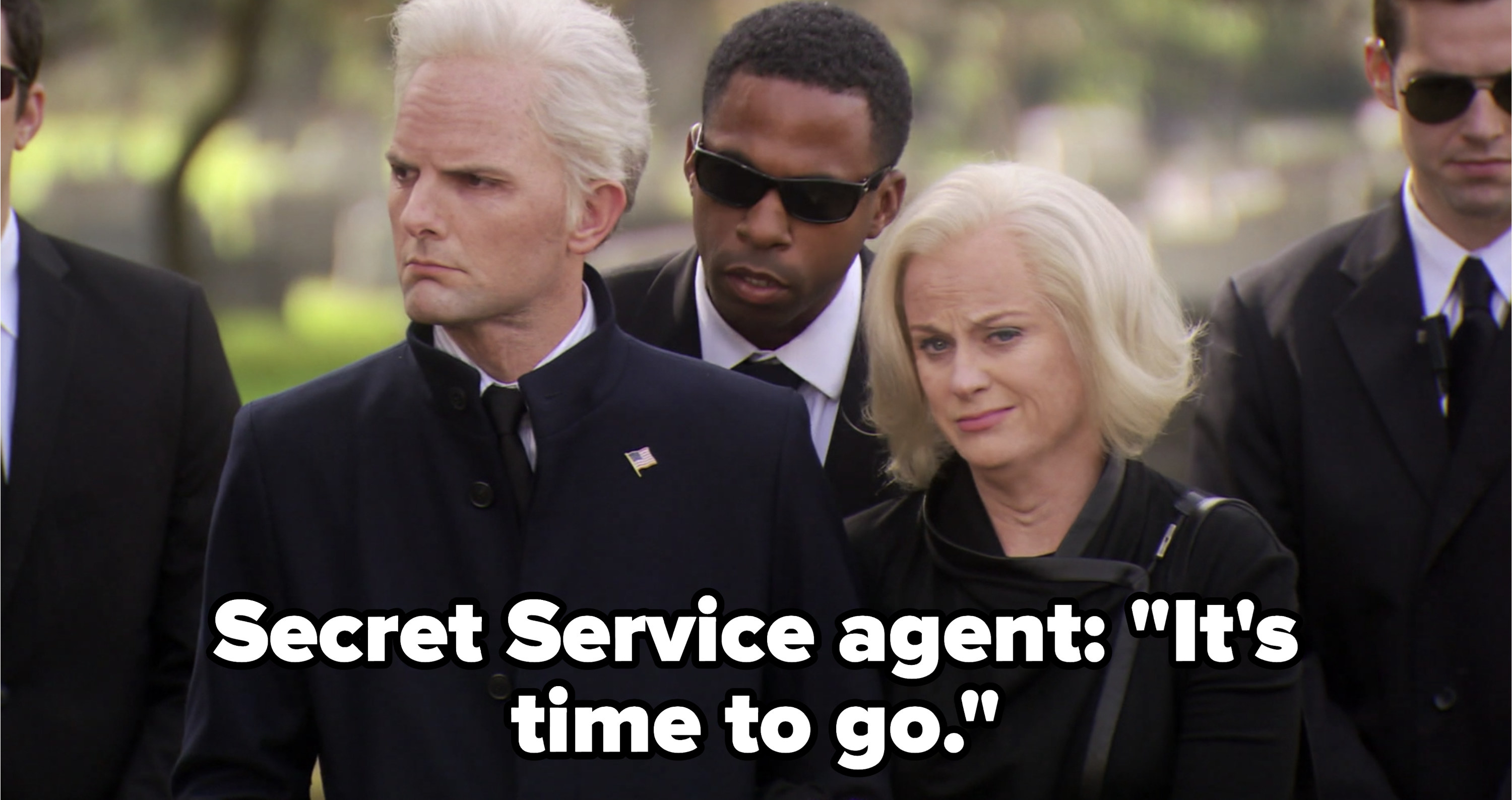 A Secret Service agent telling Ben and Leslie it&#x27;s time to go