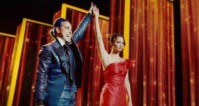 Katniss with Caesar Flickerman in &quot;The Hunger Games&quot;