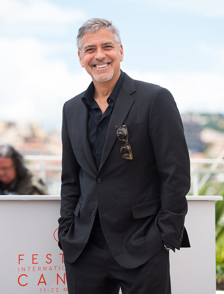 George Clooney stands with hands in pockets at the &quot;Money Monster&quot; photocall at Cannes
