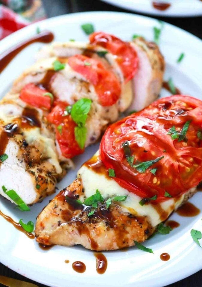Caprese chicken drizzled with balsamic.