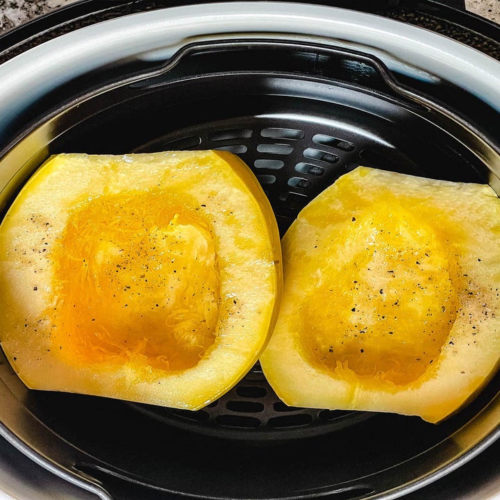 Spaghetti squash halves in the air fryer.