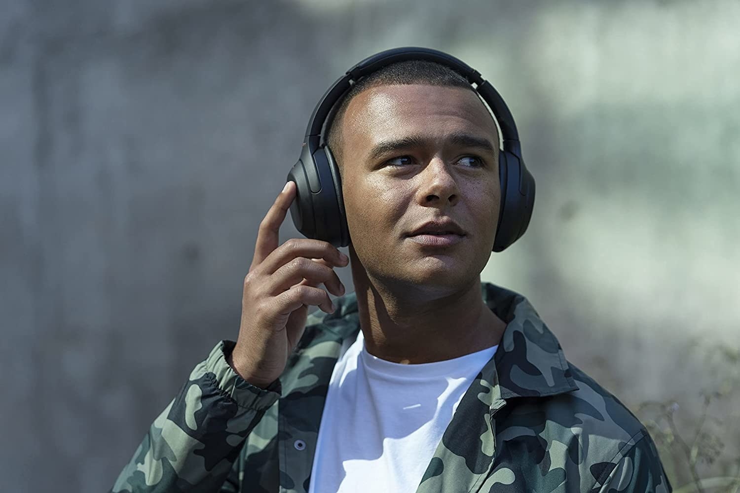 A man listening to music on the Sony headphones