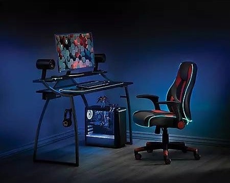 The gaming desk set up with a single monitor computer