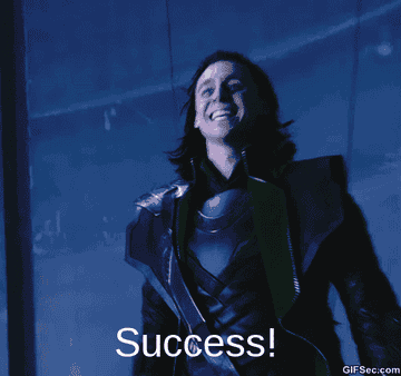 Loki throwing his arms in the arm and declaring success!
