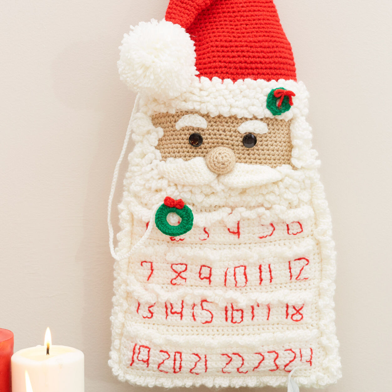 a crocheted santa advent calendar