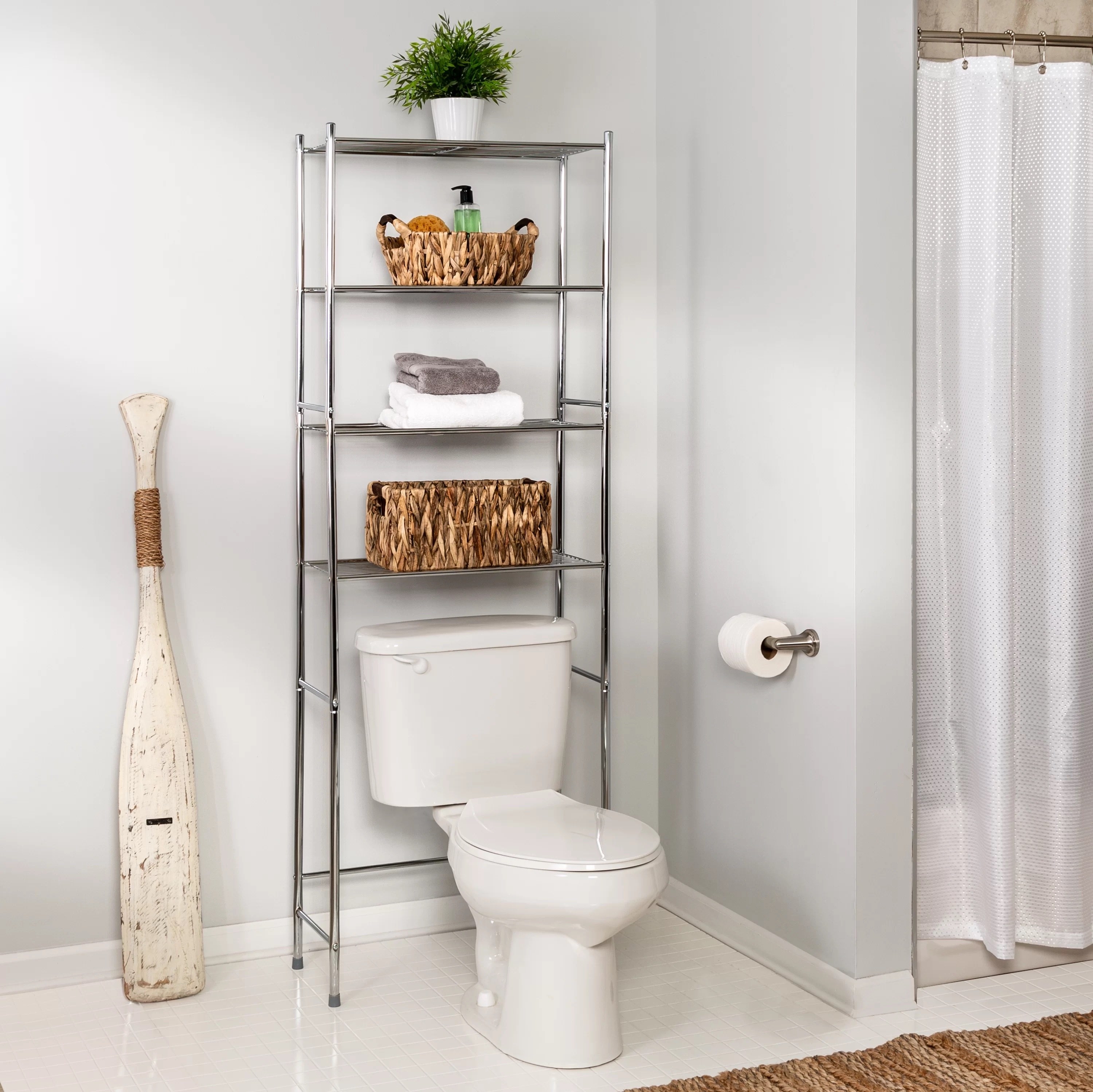 A simple silver over the toilet organizer