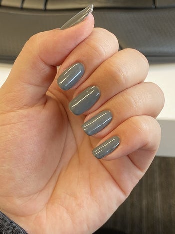 Reviewer's gel nail manicure in a grey color