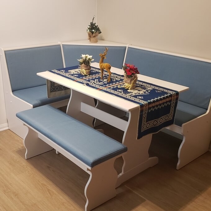 A reviewer&#x27;s photo of the blue dining nook