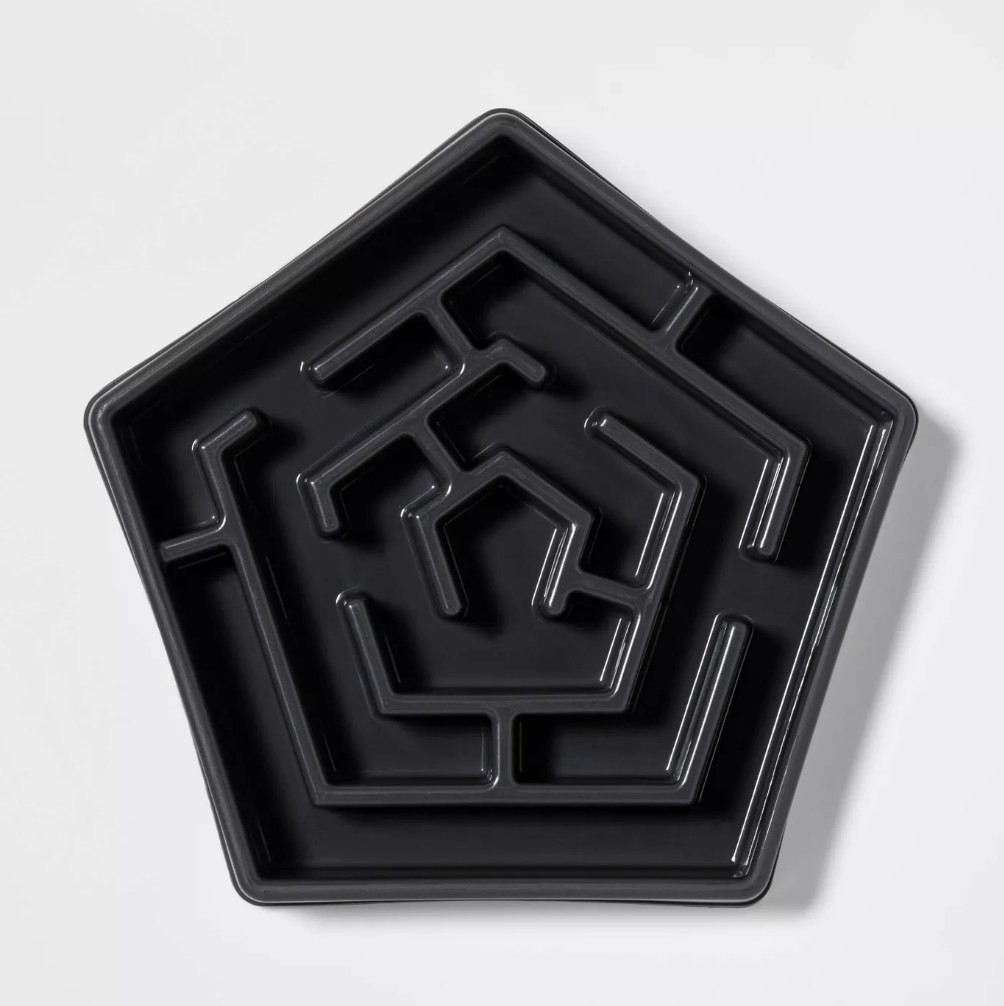 A black, slow eat maze dog bowl