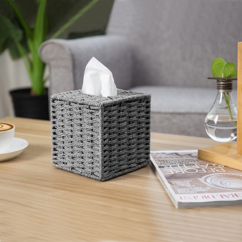 The grey tissue box cover in use