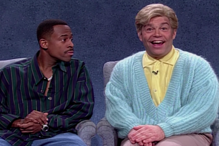 Martin Lawrence next to an enthusiastic person during a sketch
