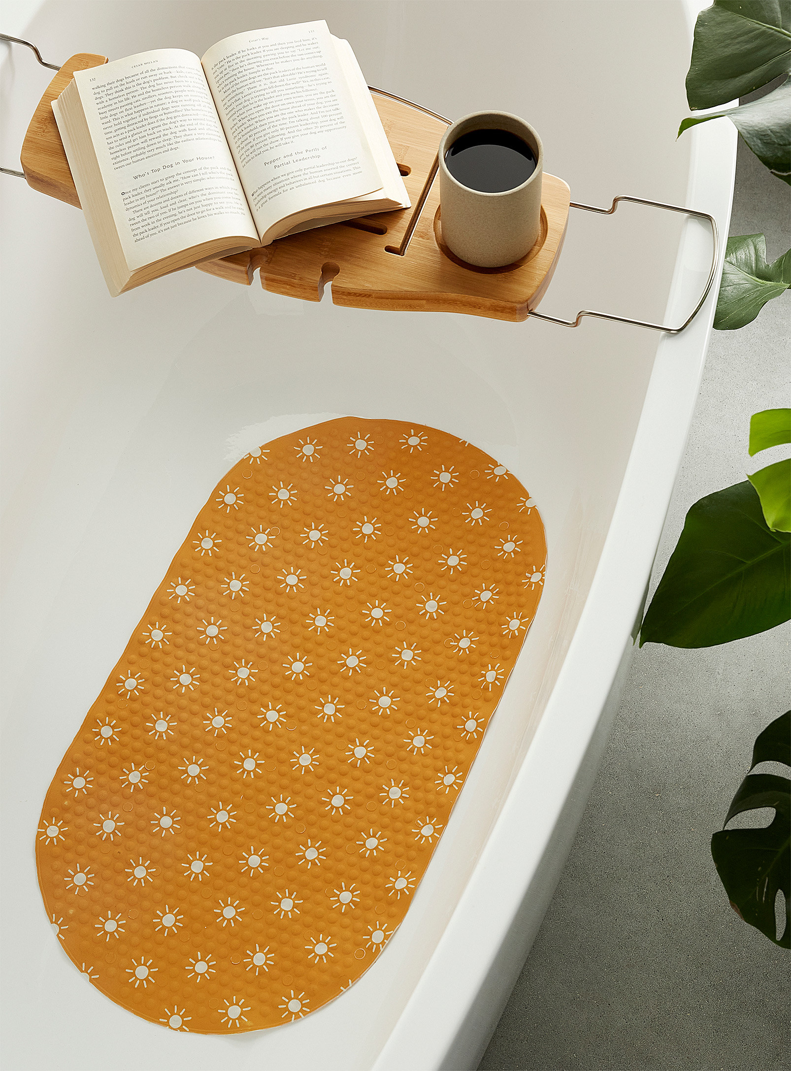 A mat stuck to the bottom of a bathtub