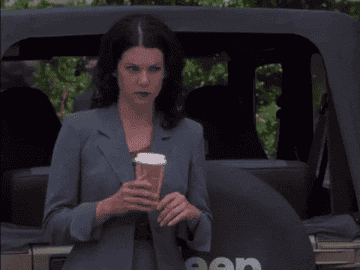 Gif of Lorelai drinking a cup of coffee