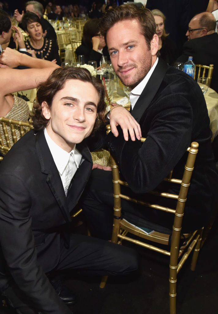 Timothee Chalamet (L) and Armie Hammer pose for a photo while sitting during The 23rd Annual Critics&#x27; Choice Awards
