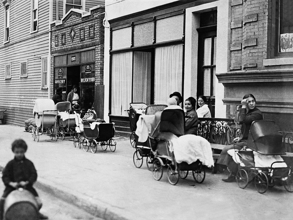 People with baby carriages in front of the Sanger Clinic on Amber Street in Brooklyn, New York, October 1916