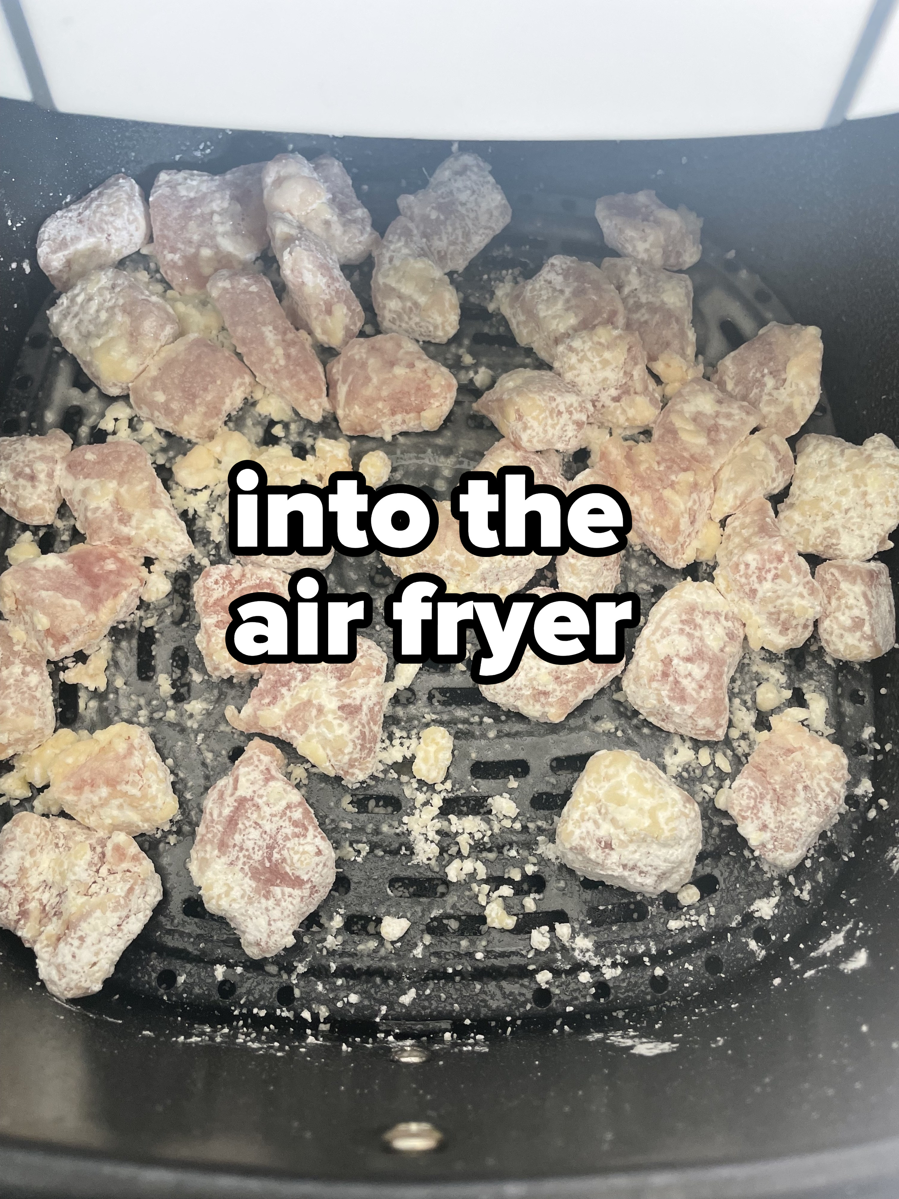 Air frying the pork pieces