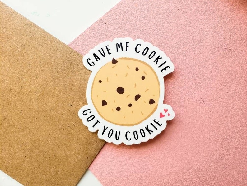 sticker shaped like a cookie with text &quot;gave me cookie got you cookie&quot; and little hearts
