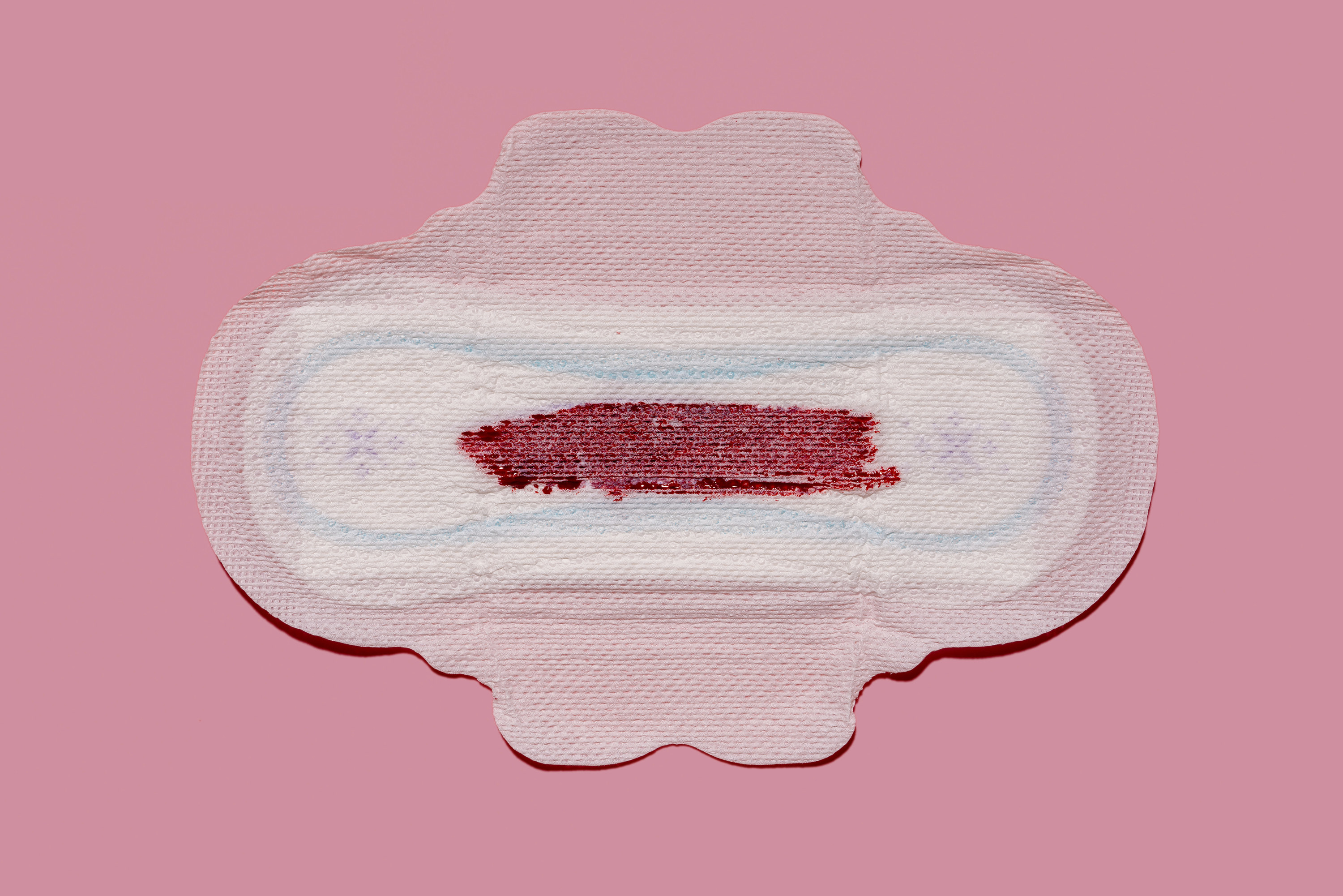 Stock image of red blood on a maxi pad