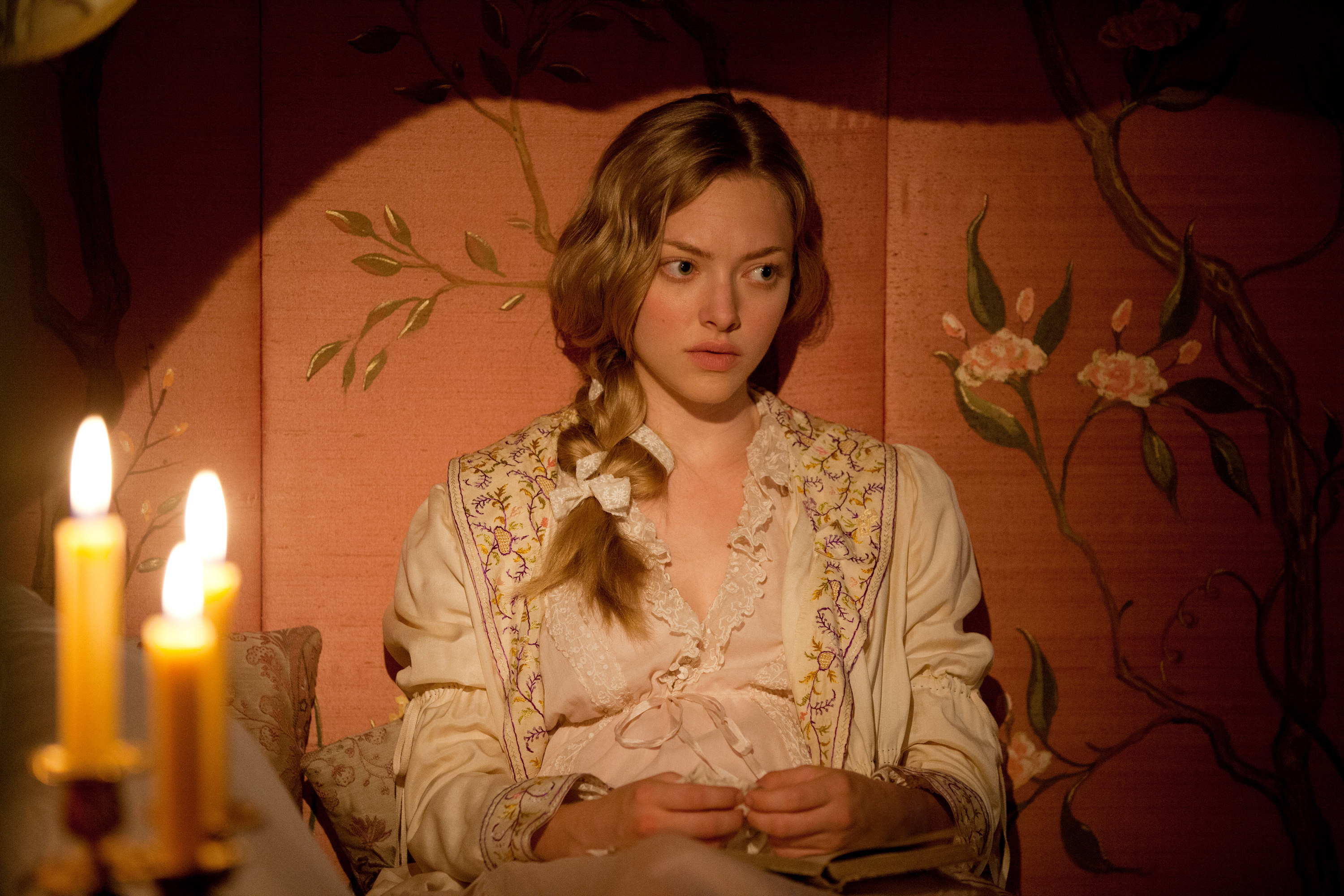 Amanda Seyfried in Cosette&#x27;s bedroom in the film