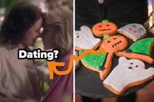 Dani and Jame from "The Haunting of Bly Manor" lean their foreheads together and a platter of cookies in Halloween shapes like ghosts and pumpkins
