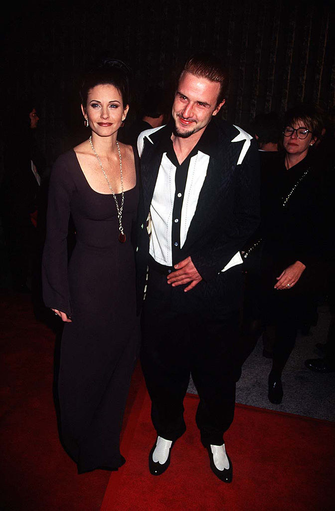 Courteney Cox and David Arquette arriving at the Scream world premiere red carpet