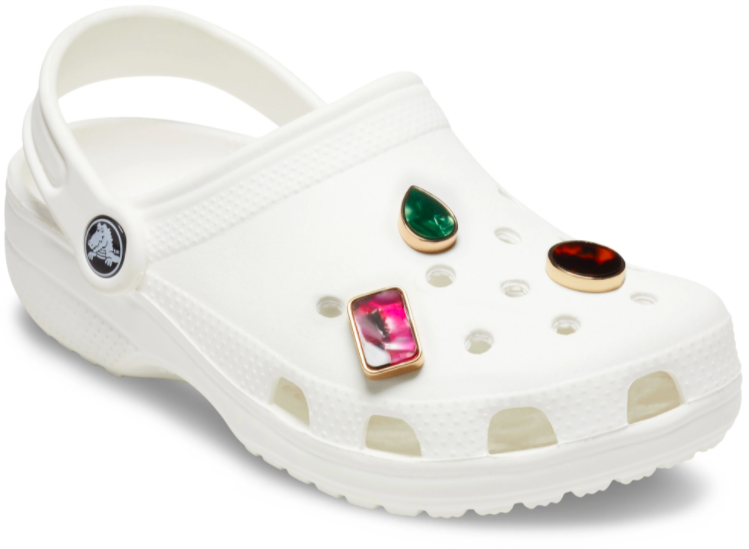 Croc with charms on it