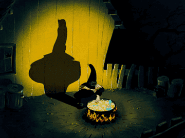 An animated witch casts spells with her cauldron