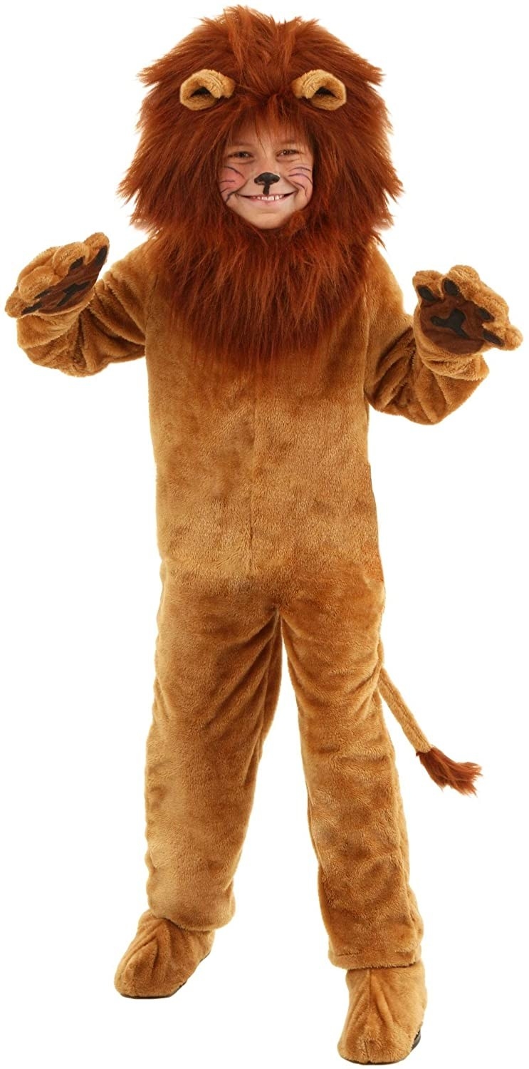 A child model wearing the lion onesie