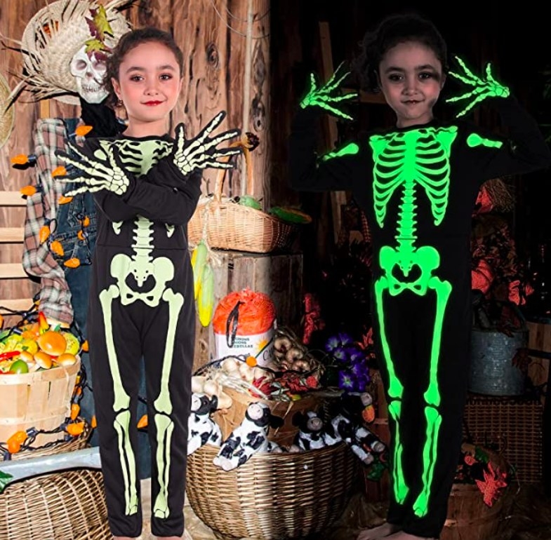Side-by-side of the same girl wearing the costume in daylight and darkness