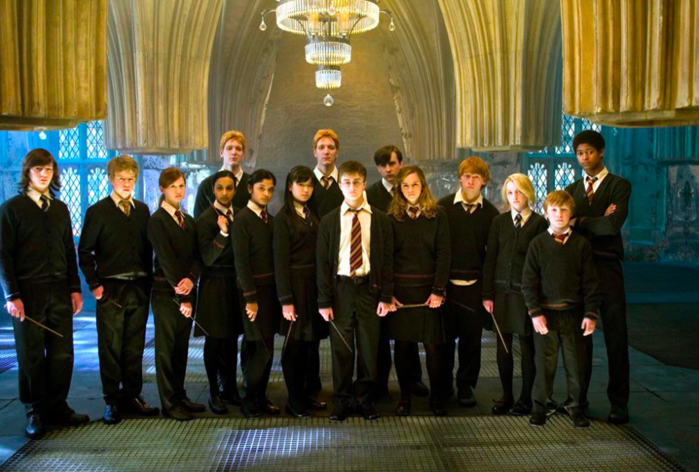 A photo of the Order of the Phoenix, in which Ginny is wearing pants