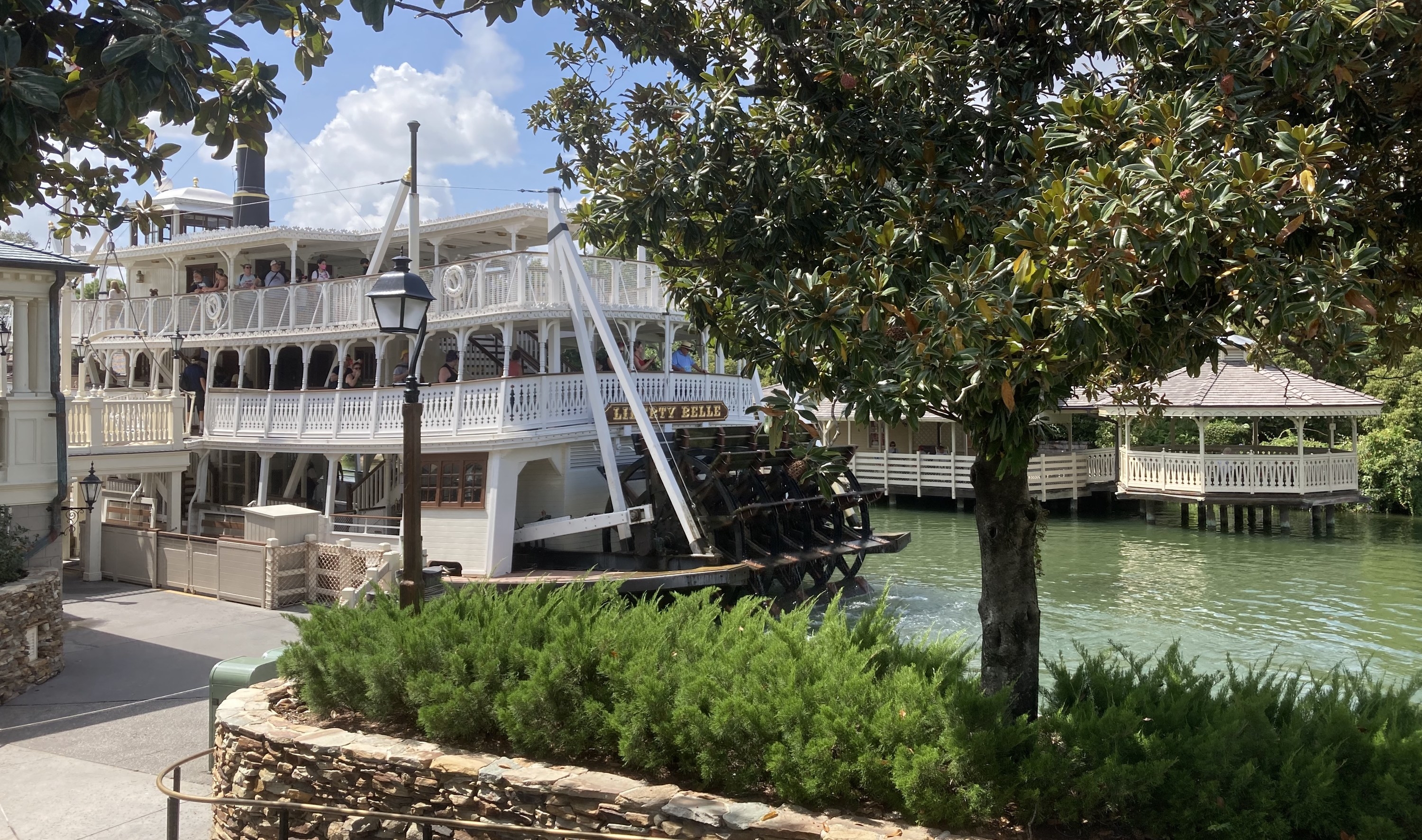 The Liberty Belle docked in front of Tom Sawyer Island
