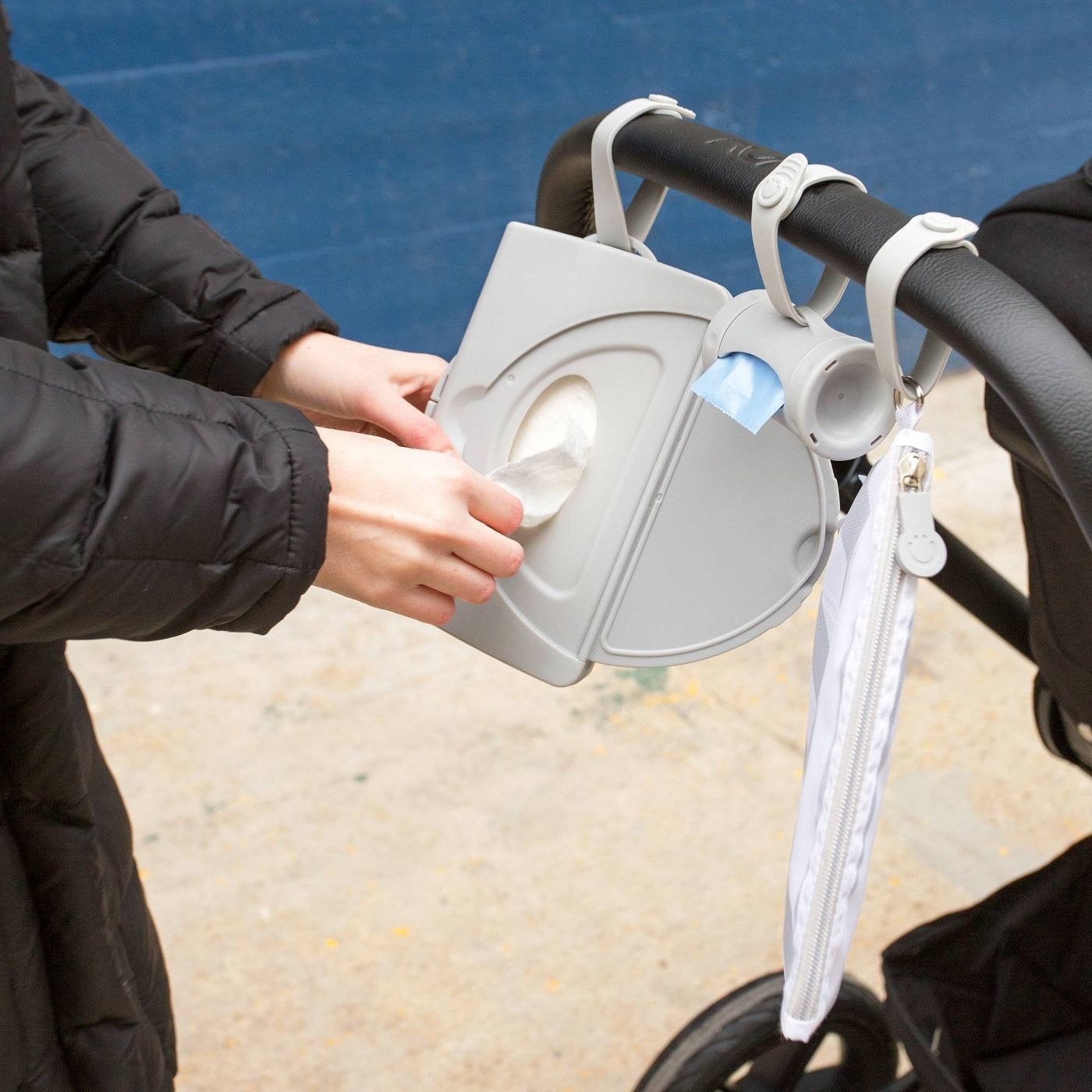 the wipe dispenser attached to a stroller