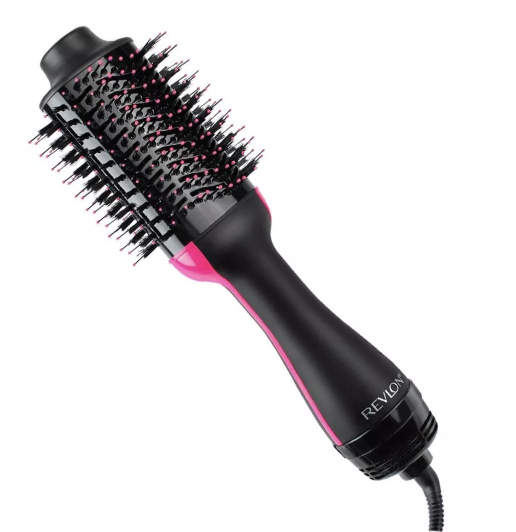 The black and pink round brush says &quot;Revlon&quot;