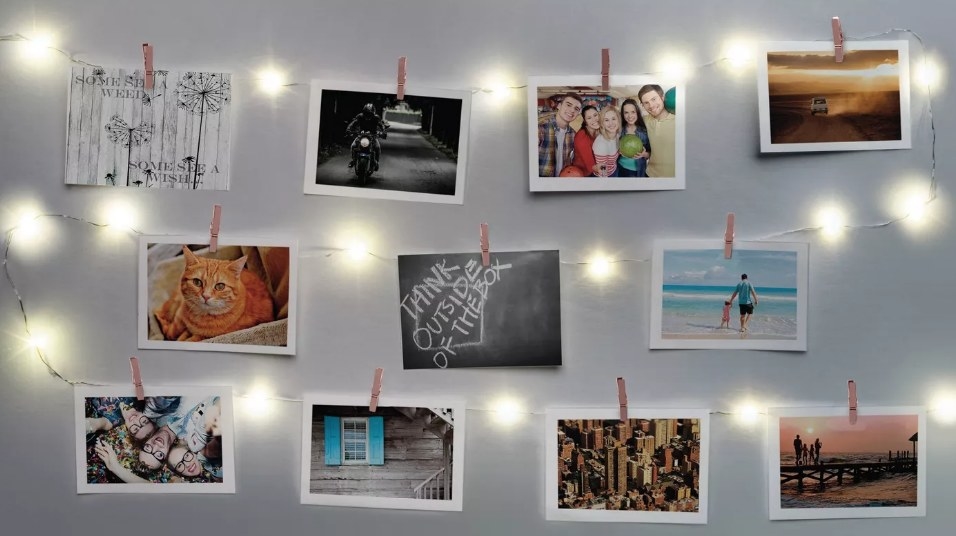 Firefly lights with clips holding pictures