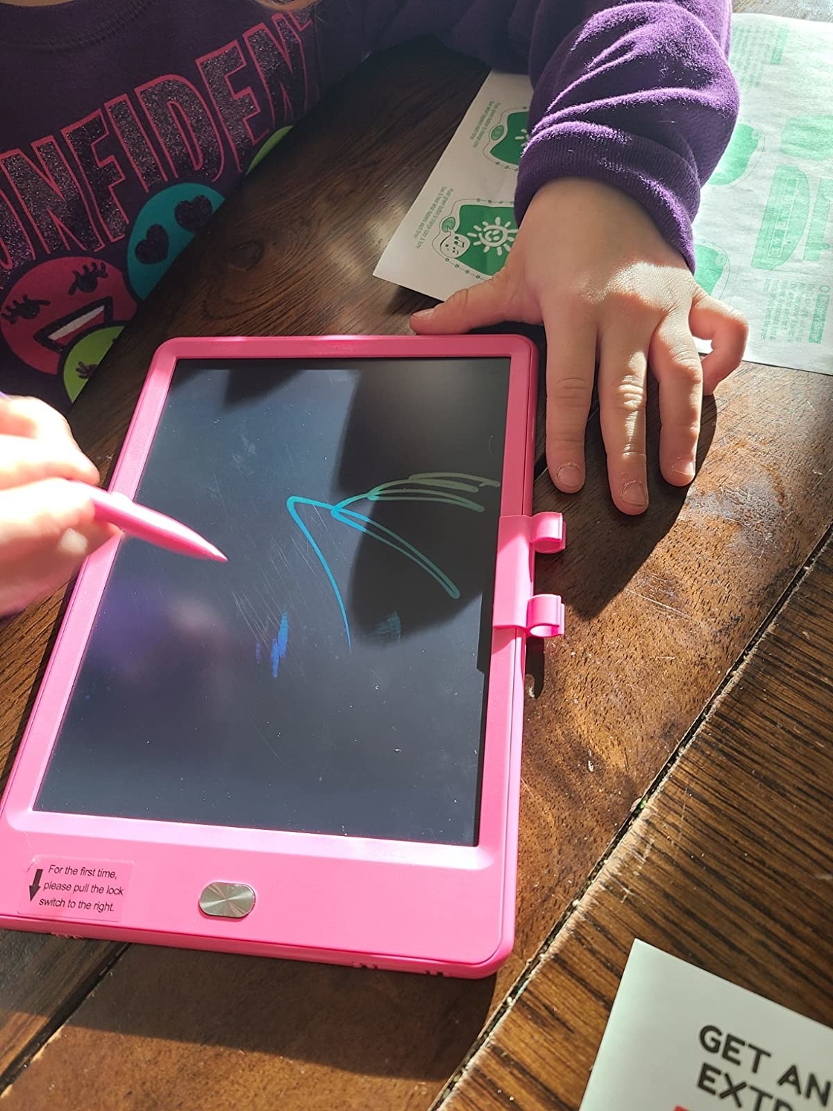 Reviewer photo of a a child drawing on the tablet