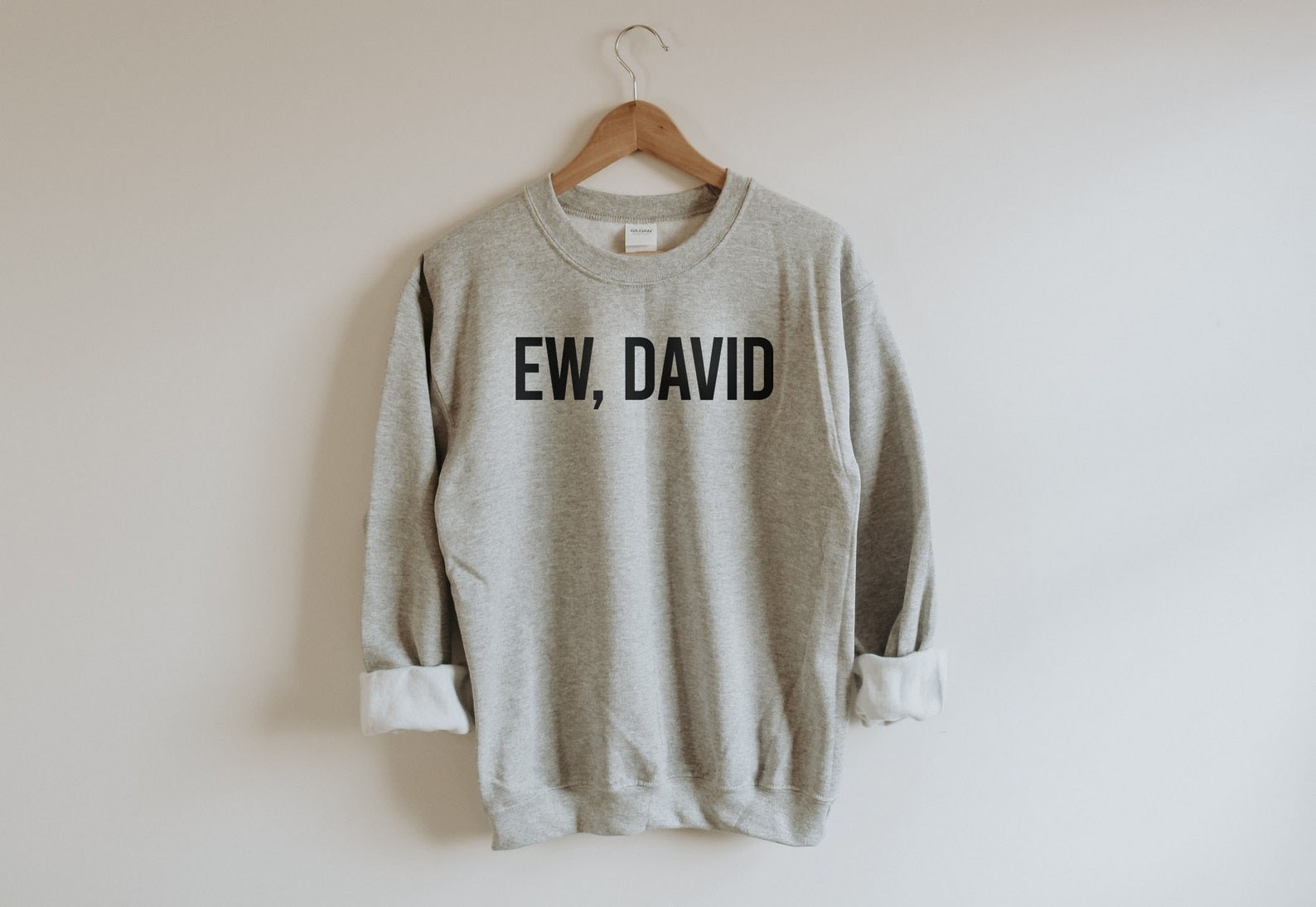 The sweatshirt that reads, &quot;Ew David&quot;
