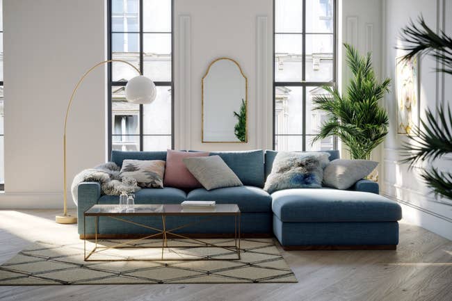 the blue sectional in a living room