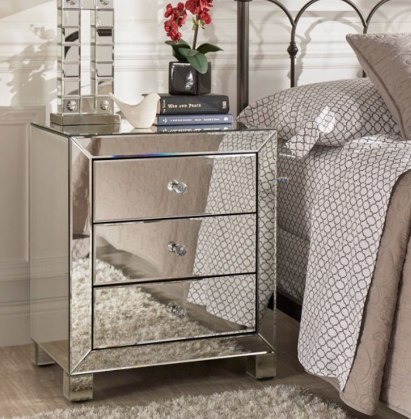 A silver mirrored, 3-drawer side table
