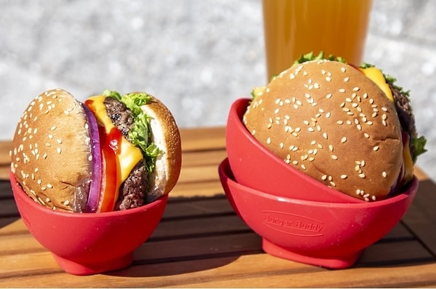 two hamburgers that are placed in the silicone holders