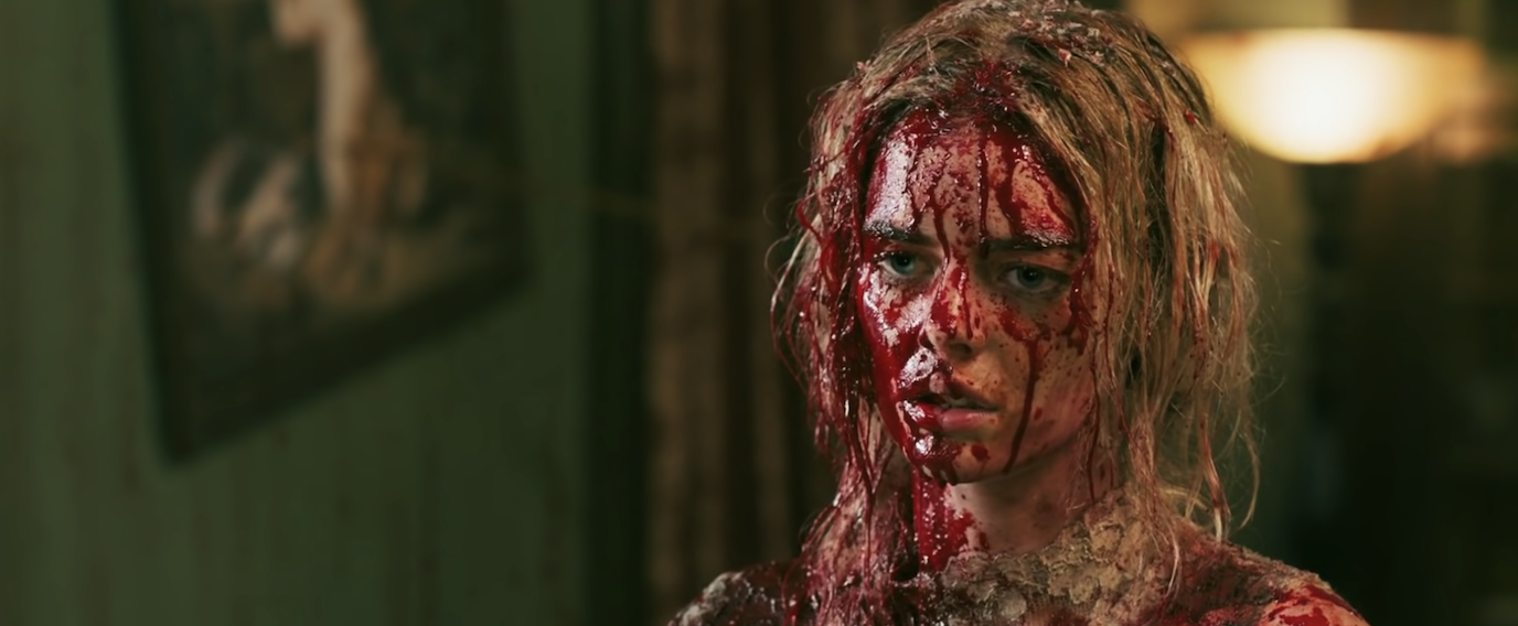 Samara Weaving absolutely covered in blood