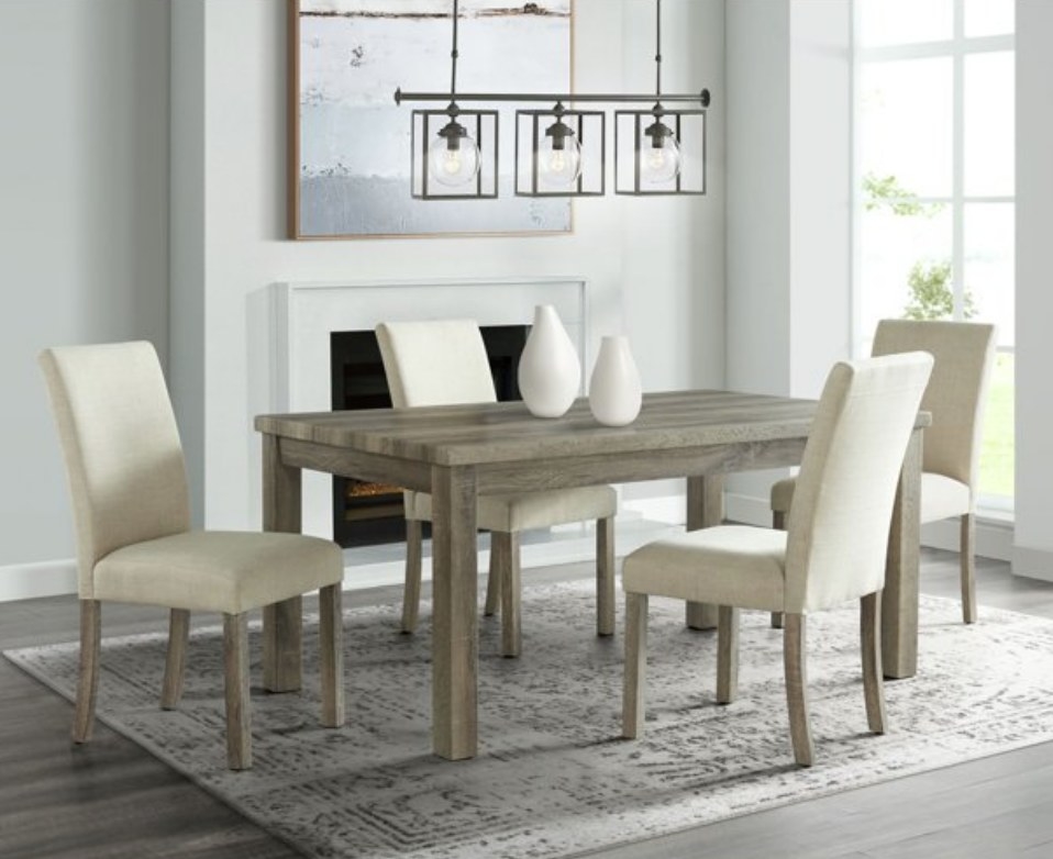 A 4pc oak dining set with beige upholstered seats